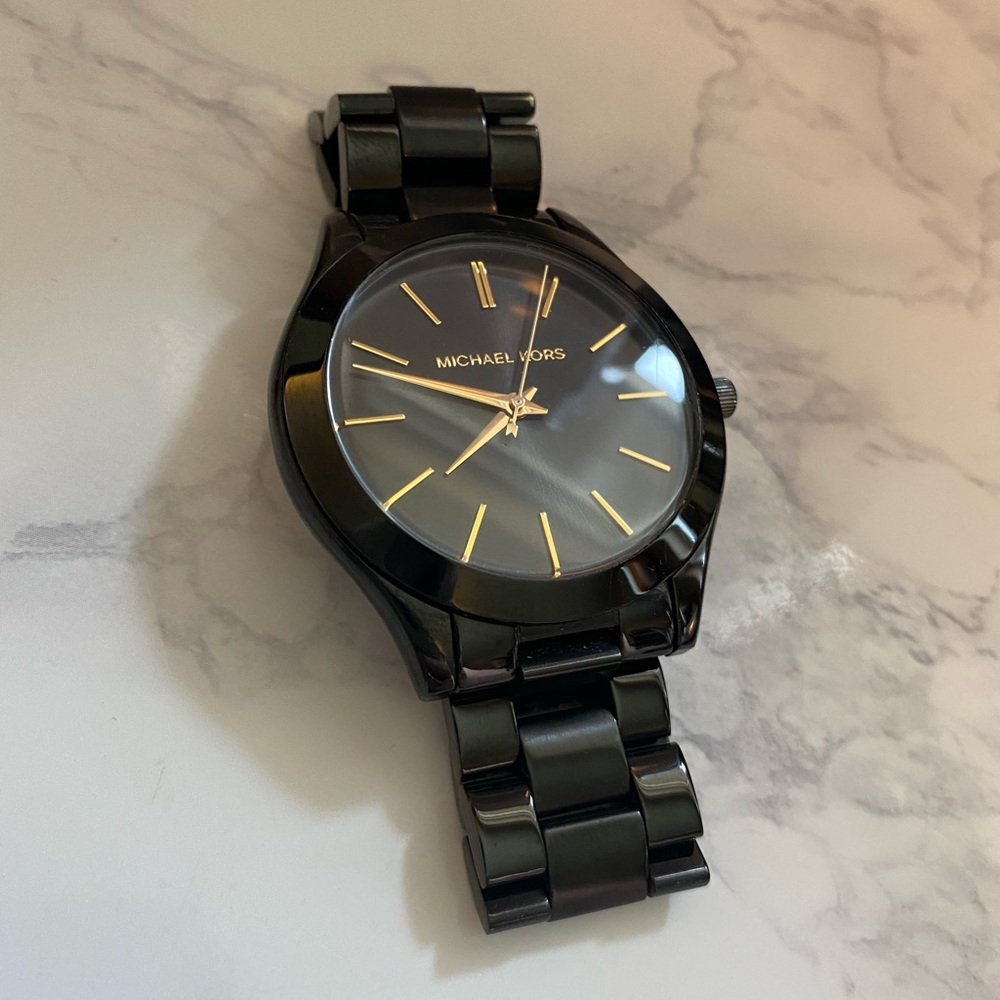 Michael Kors Women’s Black and Gold Watch
